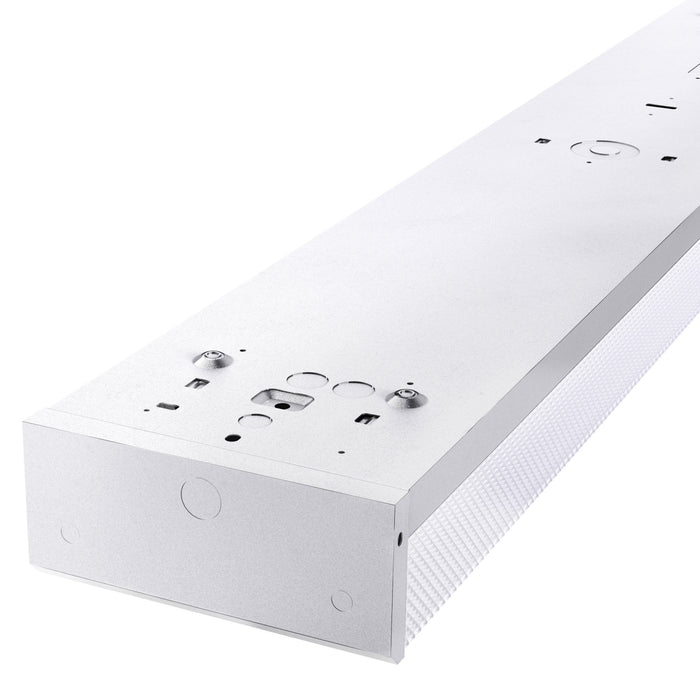 The 4ft LED Ready Wraparound Fixture features a prismatic lens for low-glare illumination, non-shunted sockets, and dual-end pre-wiring for optimal lighting performance.