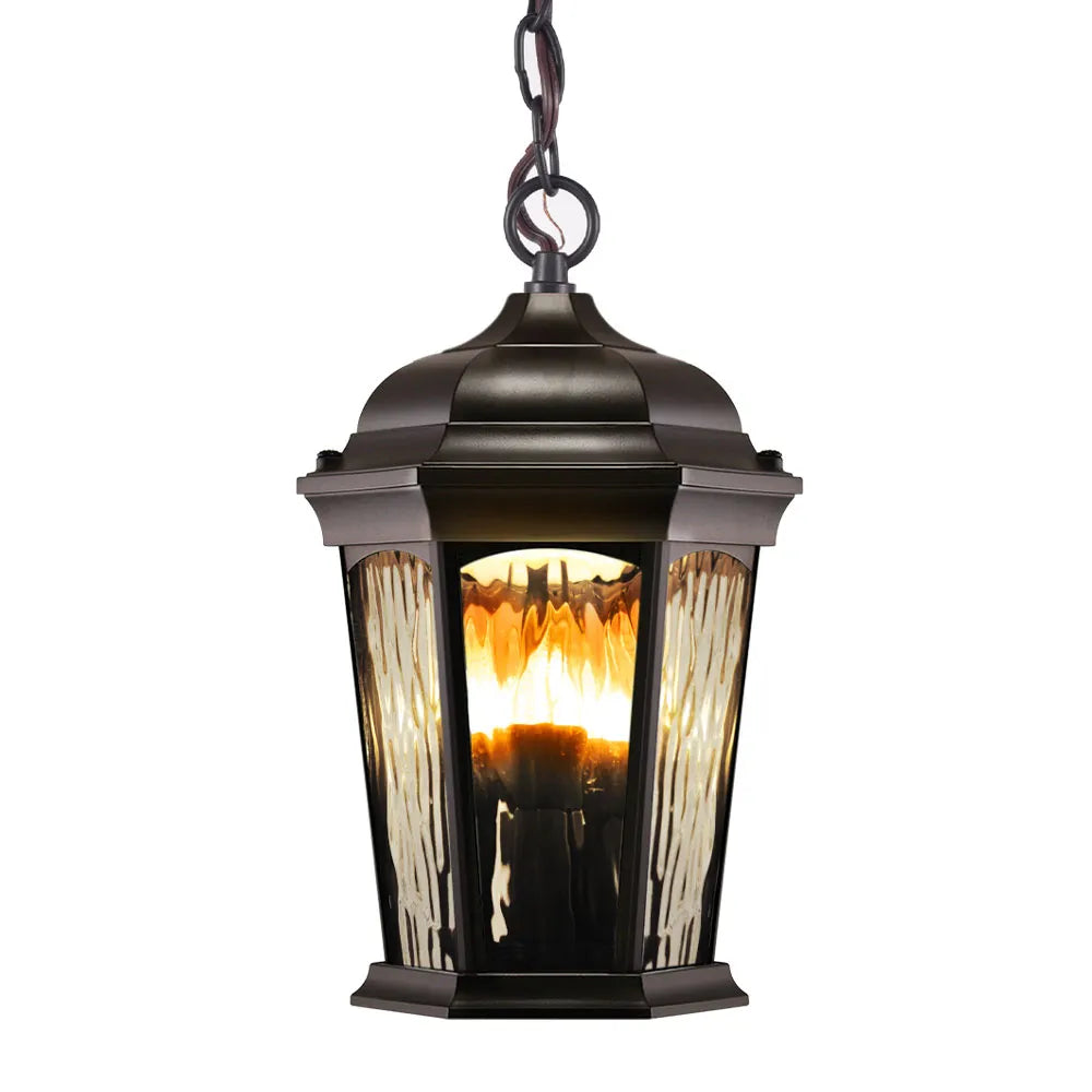 Bronze hanging lantern isolated with flame illumination