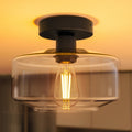 Crafted with a sturdy metal base and a crystal-clear glass shade for lasting beauty.