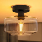Crafted with a sturdy metal base and a crystal-clear glass shade for lasting beauty.