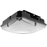 The LED Canopy Light is designed to be mounted on ceilings, providing illumination for areas such as parking lots, shopping areas, and more. Its die-cast aluminum housing contains these features, providing durability and heat dissipation and making it a perfect choice for outdoor applications.