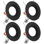 Four black baffle retrofit downlights with spring clips, orange connectors, and E26 adapters on white background.