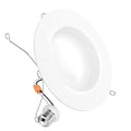 Angled 5/6 inch smooth retrofit light with E26 adapter, spring clips, orange connector, and white trim.