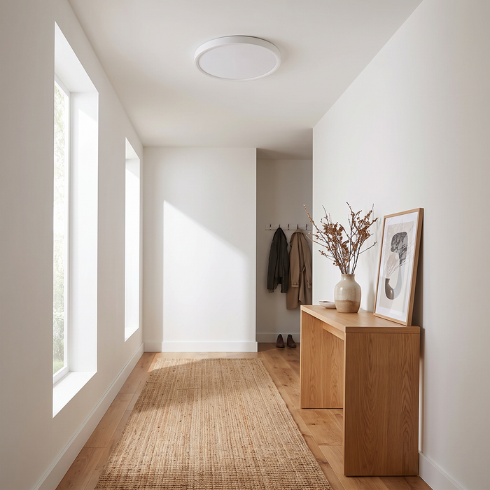 White round flush-mount ceiling light hallway application