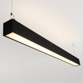Black architectural linear pendant installed illuminated