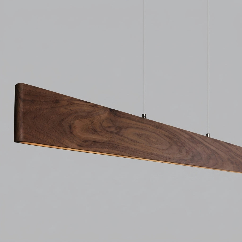 Walnut linear pendant wood-body close-up reused from shorter-family detail image