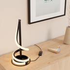 Sculptural Curve LED Table Lamp — in a room setting