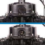 Close-up of a black mechanical component with visible branding on a white background.