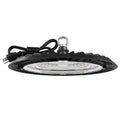 UFO high bay light side view. Black UFO high bay LED with coiled plug cord and hanging eyelet; lens and heat-sink fins visible
