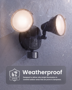 A dual-head outdoor spotlight mounted on a textured gray wall, with both lights illuminated. A dark gray banner at the bottom reads 'Weatherproof' with an IP65 icon and descriptive text about waterproof illumination in damp outdoor areas.