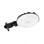 Round industrial light fixture with black arm on a white background