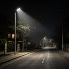 Street at night with LED flood light slip fitter mount illuminating a residential area