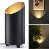 The aluminum cylindrical design and black finish of the can spotlight elegantly enhances your home's ambiance.