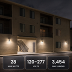Bronze LED security wall packs with photocell at an apartment building: 28 max watts, 120-277V, 3,454 max lumens