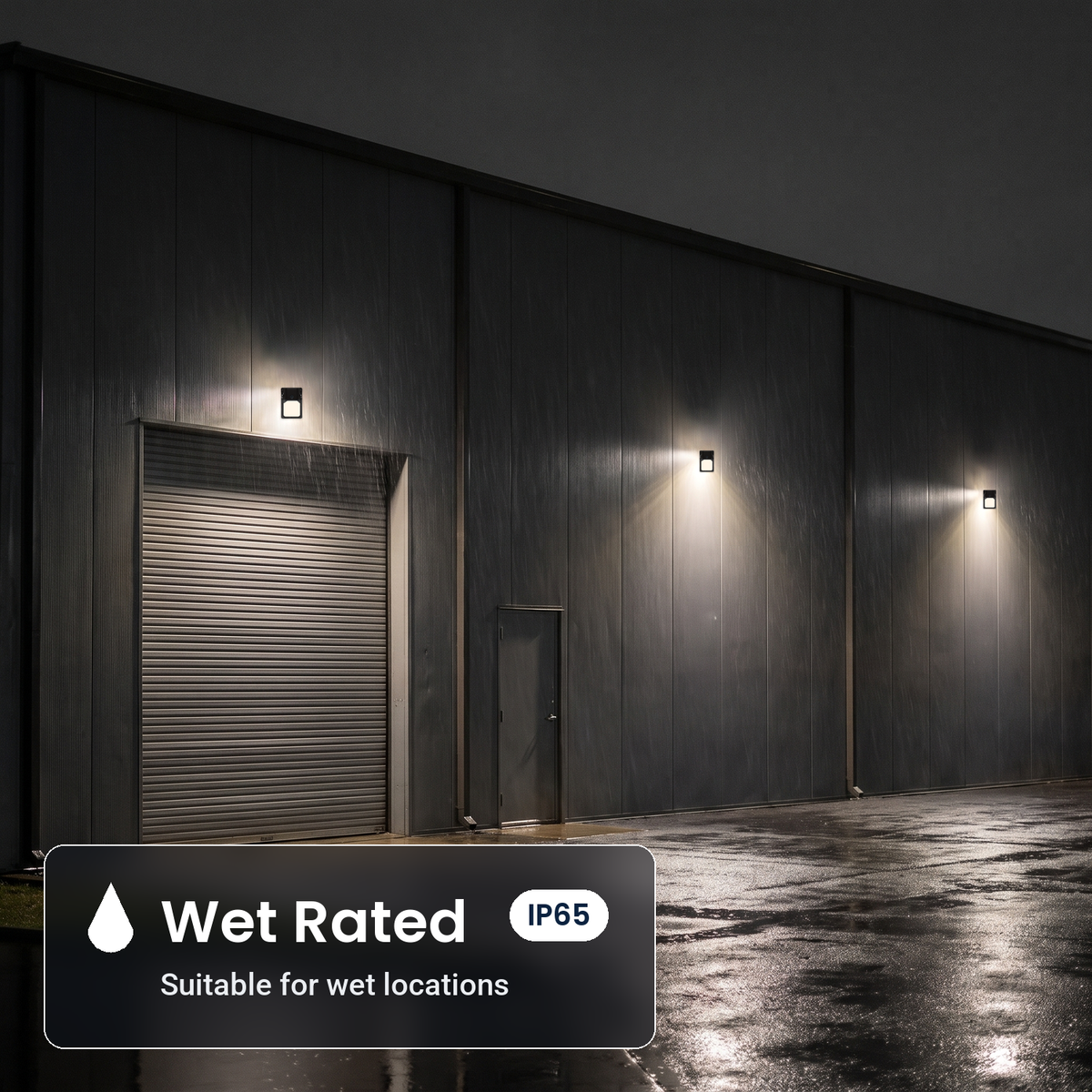 Wet rated, IP65 bronze LED security wall packs with photocell on a warehouse wall in the rain