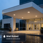 Wet rated 8 inch white motion activated commercial LED downlights in an office building entrance canopy