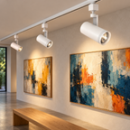 White LED track heads in an illustrative gallery setting